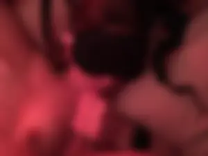 Unsuspecting blindfolded girl getting photographed while doing a tender home blowjob