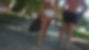 Girl with a nice ass in wet white bikini bottom