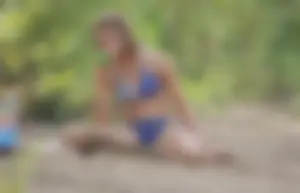 Skinny teen having fun in her little England bikini