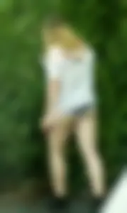 Thick girl in little shorts showing her cheeks