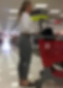 Sexy lady shopping at Target with a big ass in grey leggings