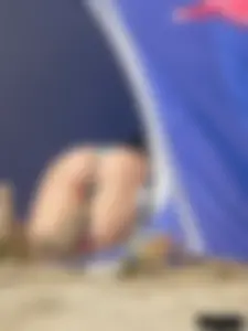 Couple of thick beach teens in little thong bikinis