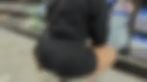 Blonde girl in black shorts