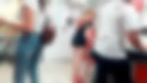 Teen in Mini Shorts at the Supermarket Counter - Hot Ass Closeup