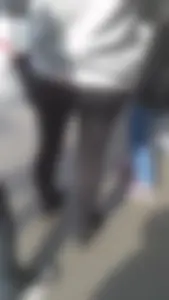 Girl wearing a black skirt over her leggings