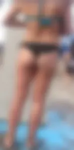 Beach shower milf in semi thong bikini with a nice ass