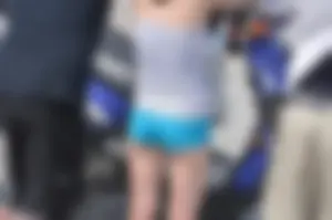 Skinny babe with a cute little ass in tiny blue shorts
