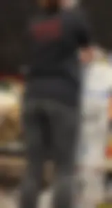 Slim clerk in tight grey jeans