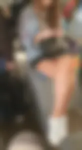 Very hot girl sitting with crossed legs in a bus, a public transport creepshot