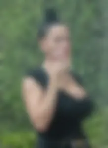 Brunette showing massive cleavage with big ass tits