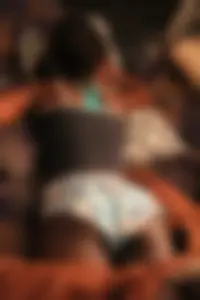 Black sexy girlfriend laying around in little shorts