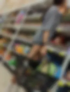 Skinny babe in booty shorts looking for groceries