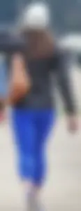 Cute girl with a nice ass in tight blue leggings along the water in San Fran
