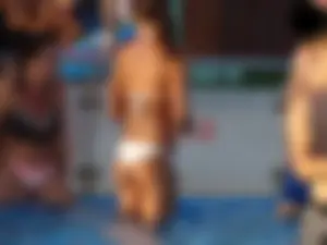 Sexy bikini babe in a white bikini at the pool with camel toe