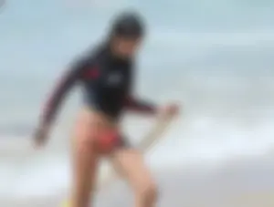 Candid surfers in bikinis