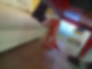 Girl in a Short Dress Under Table Kitchen Creepshot