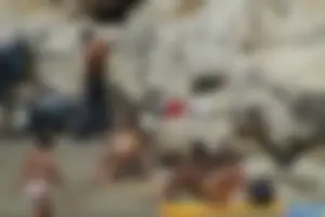 Girls on a nude beach in Sitges, Spain