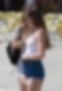 Sexy girl showing her cheeks in tight and tiny denim shorts