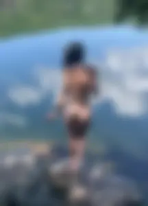 Nude girl at the lake going to sweem sneaky photo