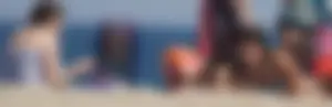 2 cute friends in bikinis on the beach