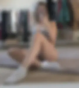 Hot Tall Girl with Great Legs in a Top and White Socks Sitting on the Floor Mirror Selfie