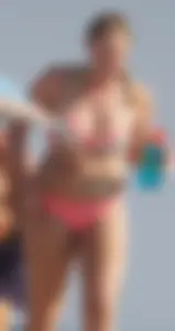 Thick blonde bikini babe on the beach