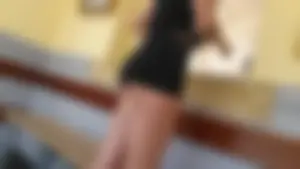 Hot brunette showing her ass cheeks in tiny shorts