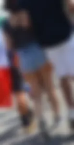 Thick booty babe in denim shorts showing her cheeks