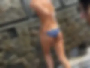 Perfect ass showering outside in water park