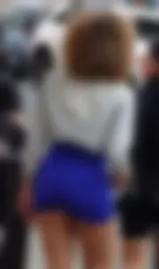 Mixed race woman in spandex shorts outfit