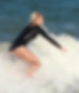 Hot surfer chicks out in the water