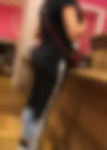 Mature sexy lady in Pink leggings shopping at Pink