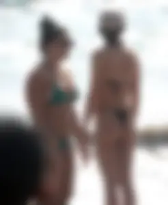 Thick and skinny friends on the beach in thongs