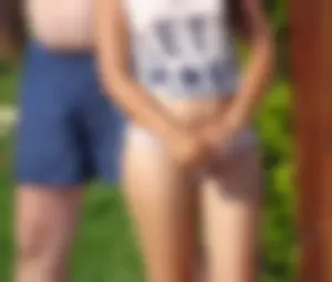 Sexy big bootied Latino girl in see thru underwear thong and white top with no bra