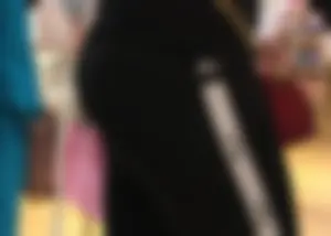 Mature sexy lady in Pink leggings shopping at Pink