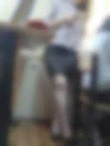 Teen in Skirt on High Heels Standing in Classroom Candid Photos