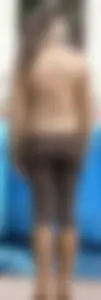Brunette babe with a nice ass in tight brown leggings
