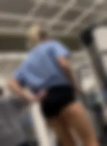 TALL VOLLEYBALL TEEN in her game shorts at gym
