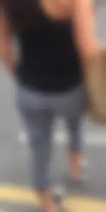 Sexy girl walking in grey patterned leggings with friend in tight jeans