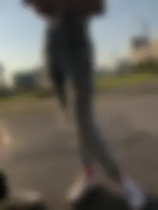 Girl in Torn Jeans Cute Legs on the Street