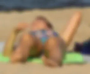 Blue floral bikini babe on the beach