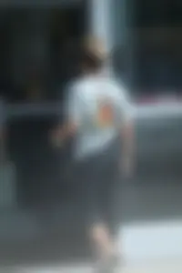 Girl going to TJ Maxx walking in the parking lot in leggings
