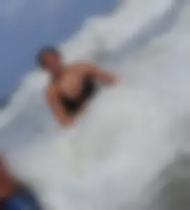 Thick beach girl with massive boobs