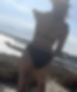 Brit mother of two on the beach