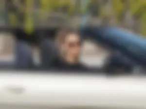 Sexy ass blonde in the parking lot in leggings with amazing body
