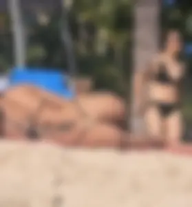 Cute petite in string bikini. Careful it will wink at you