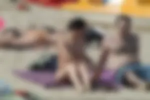 Girls on a nude beach in Sitges, Spain