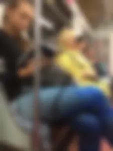 Girl in Blue Spandex Tights Reading in the Subway Train Candid