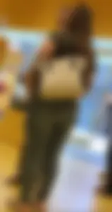 Thick brunette filling out jeans at Lego Store