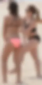 Girl in peach bikini on the beach with a great body and great ass